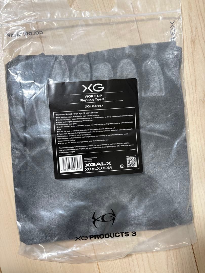 XG woke up レプリカTシャツ　Lサイズ