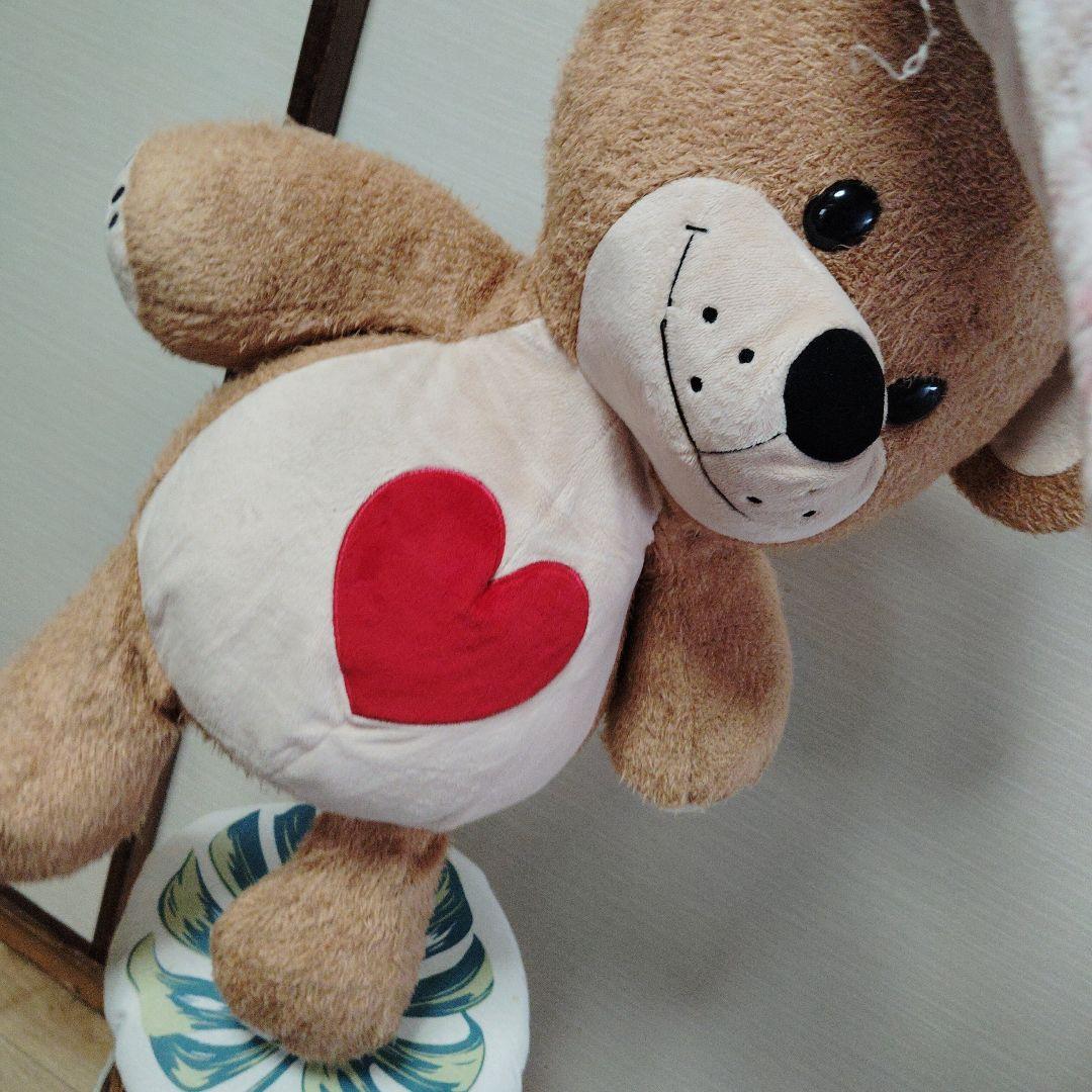 茶色いクマのぬいぐるみ 青い帽子付き