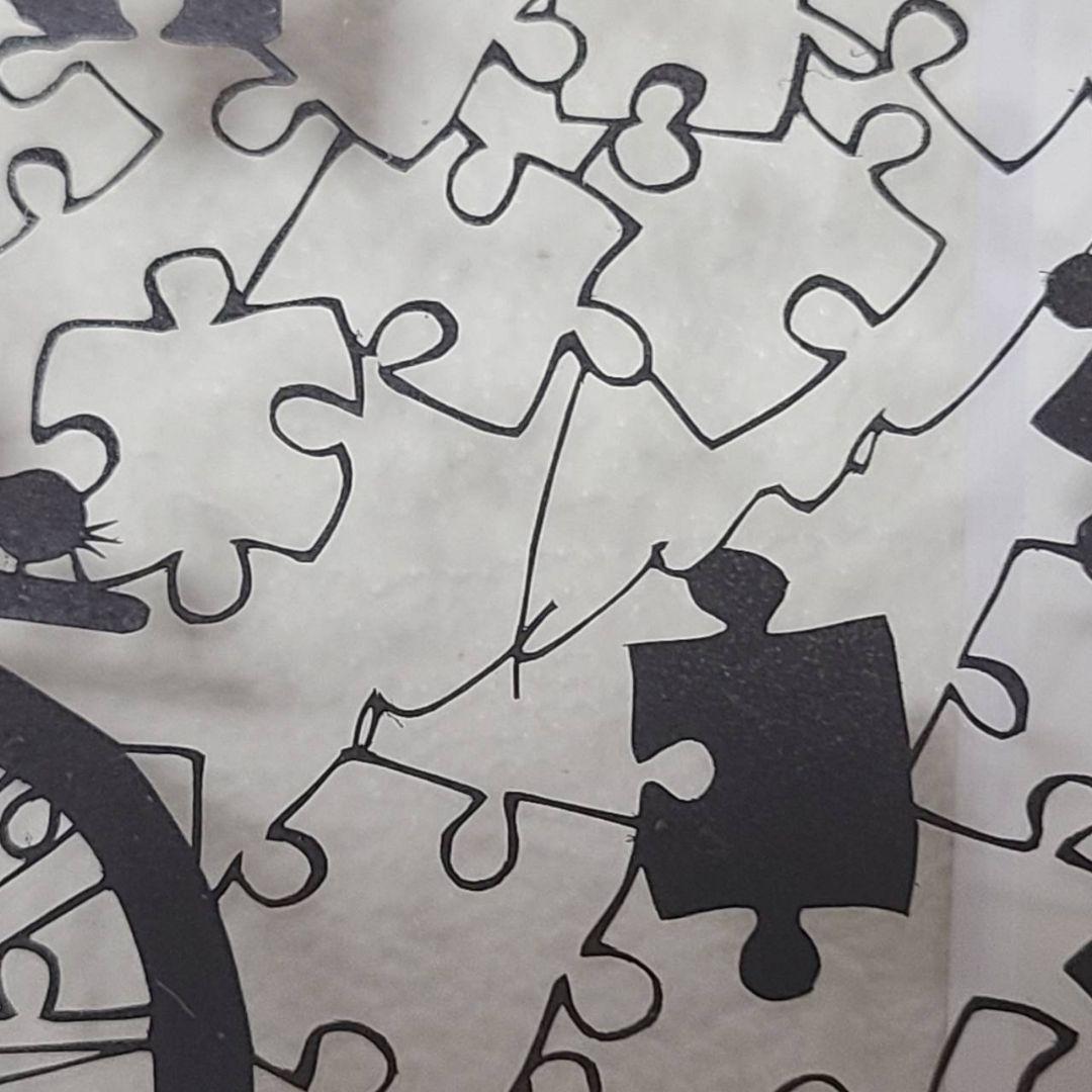 自転車とパズルピースのアート作品 切り絵