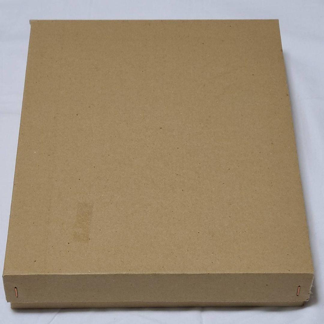 自転車とパズルピースのアート作品 切り絵