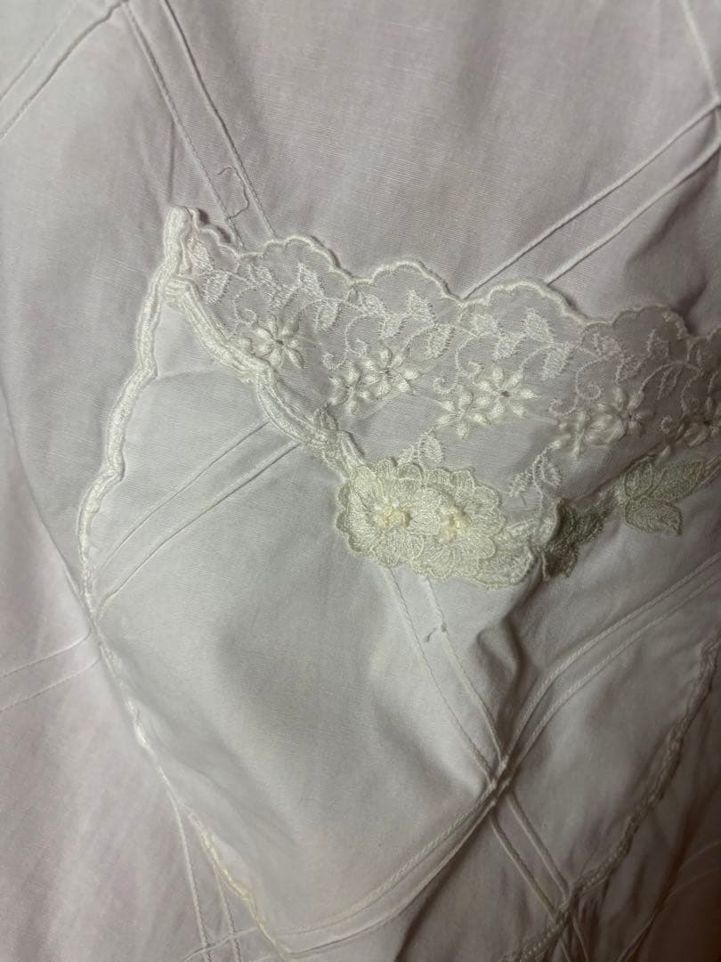 ヒスクーローネ　エプロン