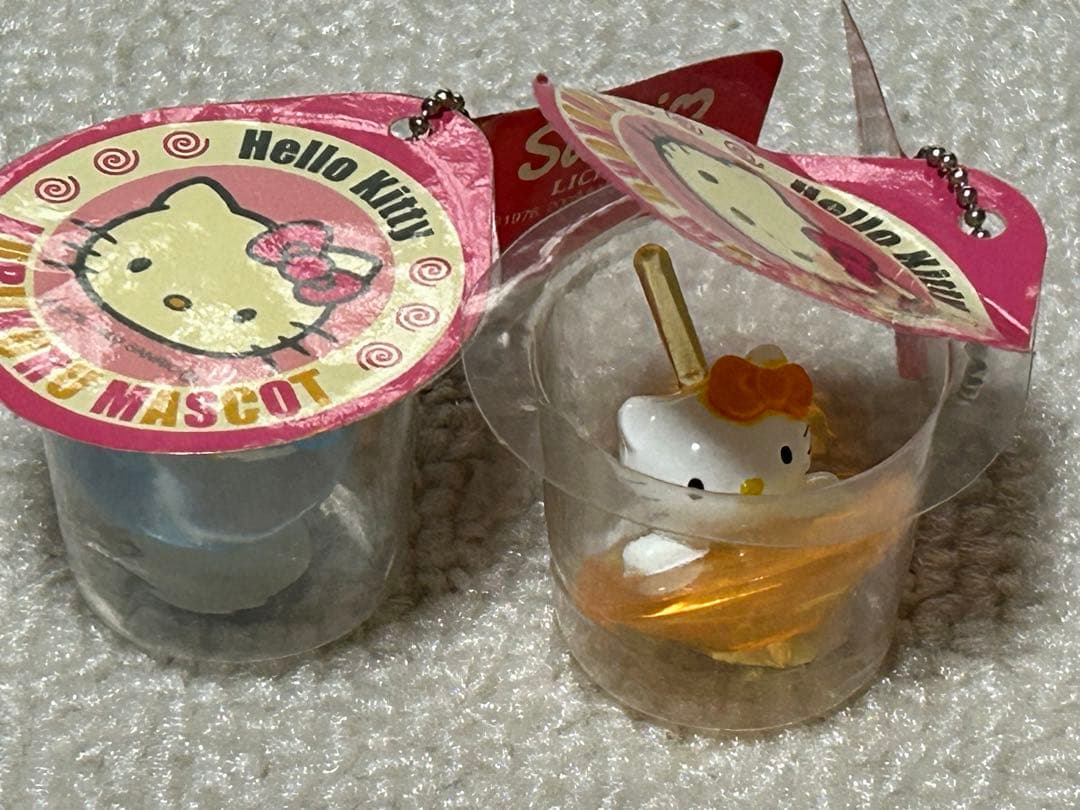 レア レトロキティアクセサリー小物雑貨 スケルトン駒コマ携帯おもちゃ 水色黄色