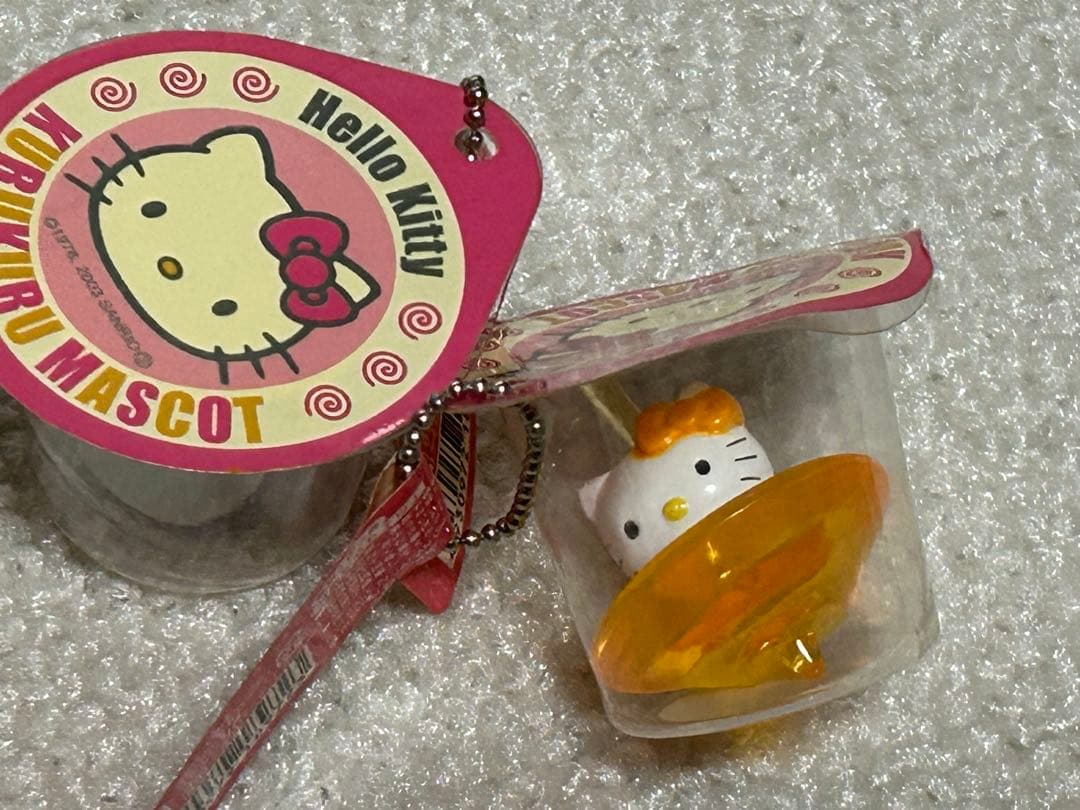 レア レトロキティアクセサリー小物雑貨 スケルトン駒コマ携帯おもちゃ 水色黄色