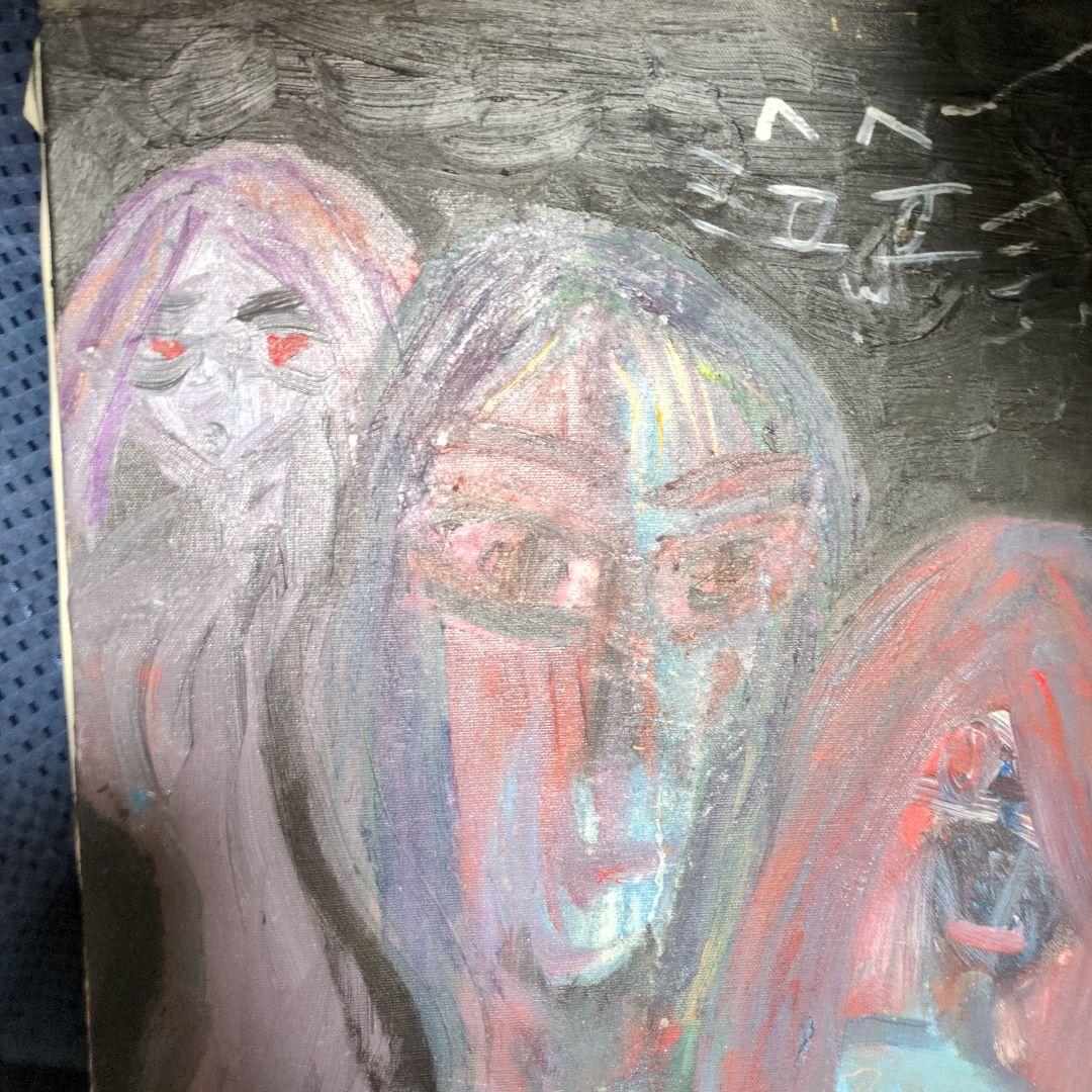 抽象画 人間と猫の顔