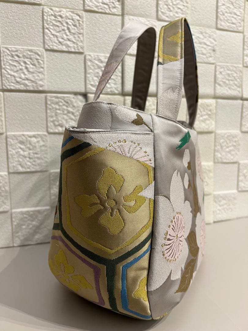 【正絹　チューリップバッグS】高級　人形師辻村ジュサブロー氏　上代49万の帯