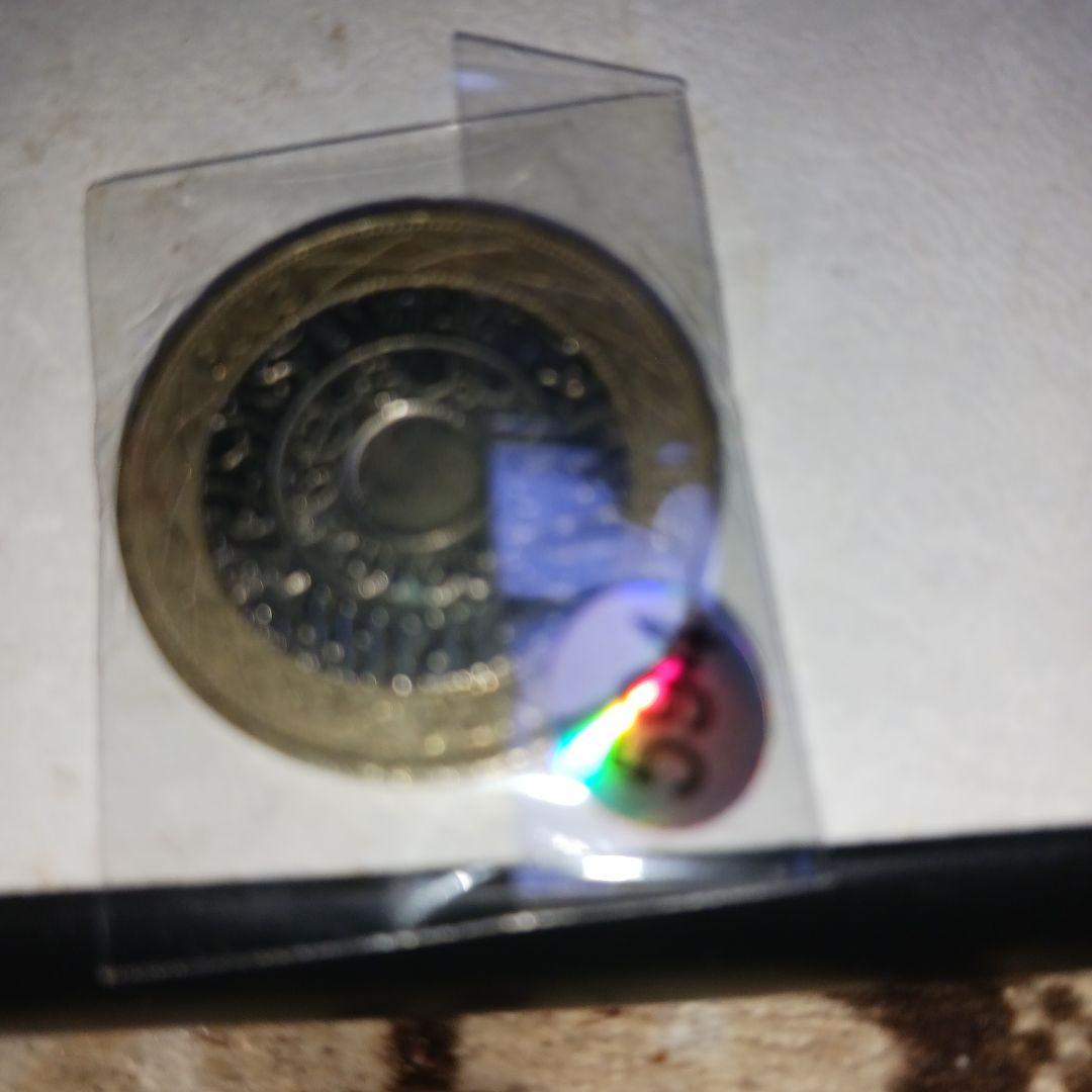 エリザベス女王、王冠デザインの旧貨幣  磁気反応無し。