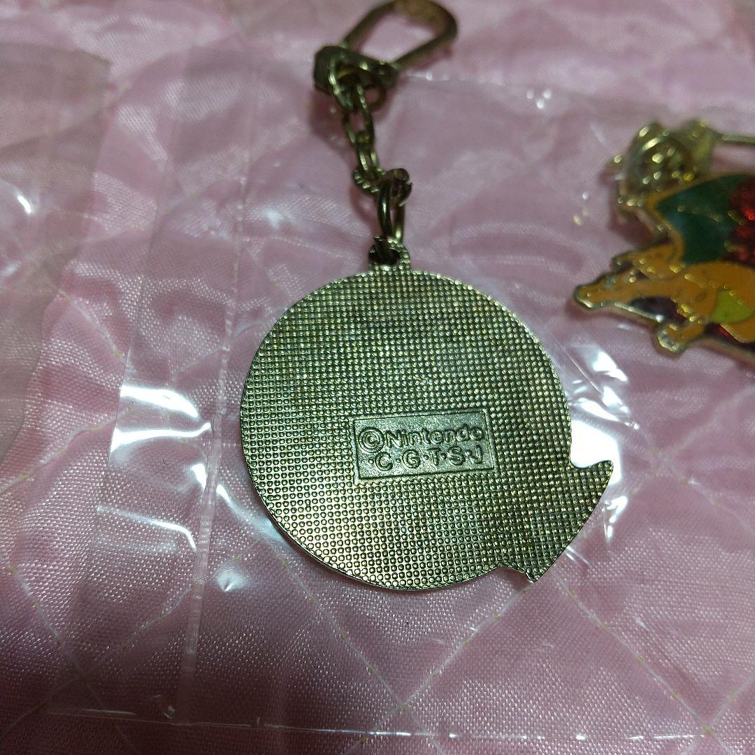 激レア！任天堂、ポケモン キラ入りメタルホルダー 16種 リザードン有り！