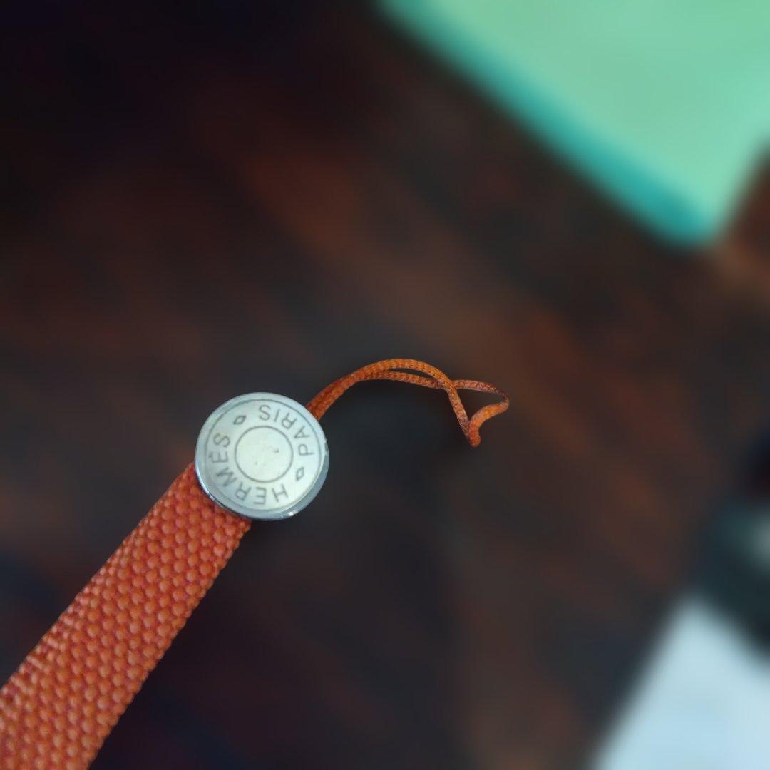 エルメス オレンジナイロンストラップ