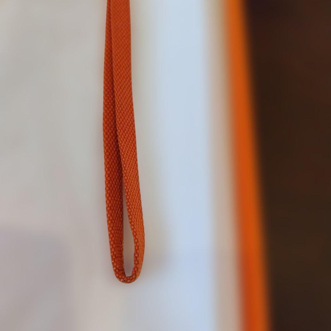 エルメス オレンジナイロンストラップ
