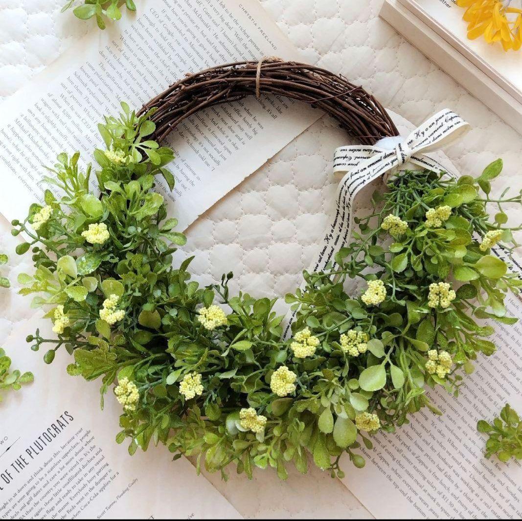 ラナンキュラスとくすみピンクスワッグ/ユーカリとカノンフラワーのハーフリース