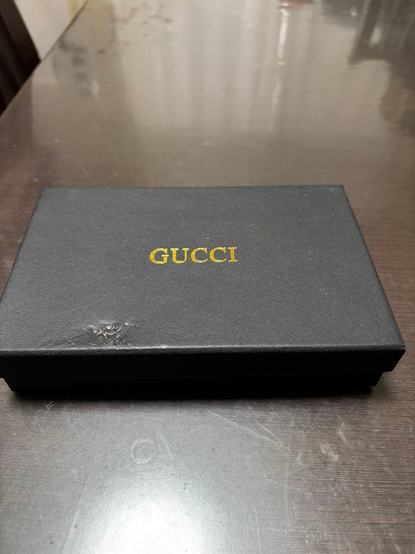 Gucci GGパターン 手帳型ケース ストラップ付き