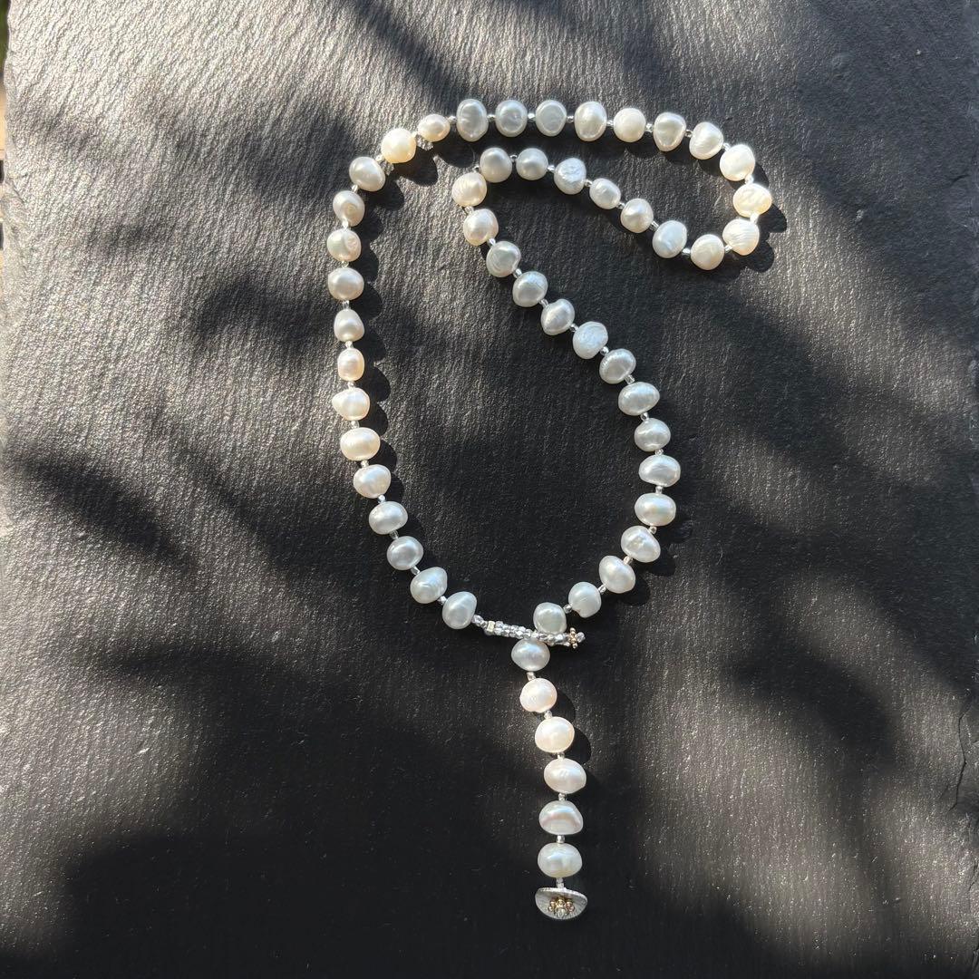 パールとカレンシルバーのネックレス