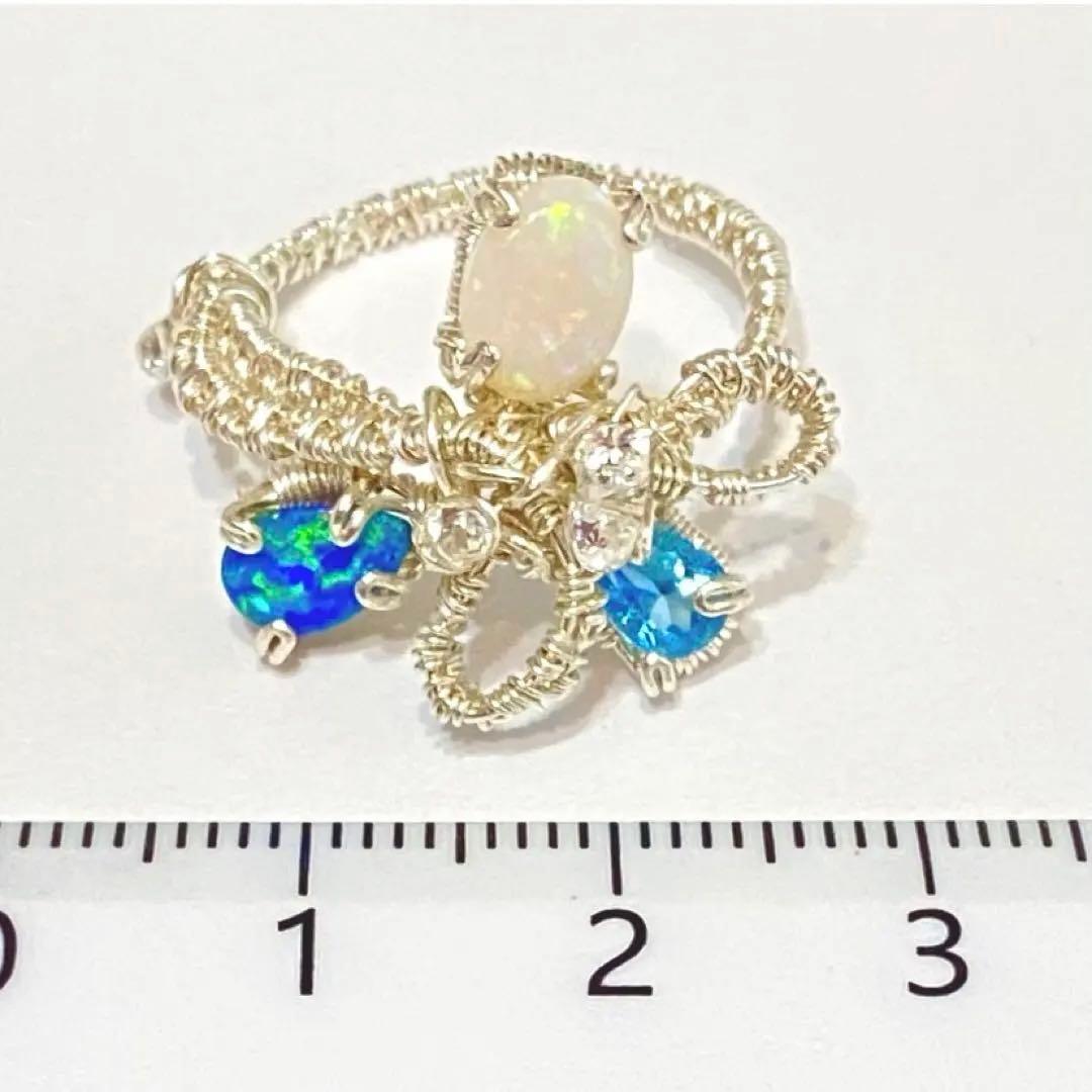 【指先に結ぶ虹】オパールとダブレットオパール青の宝石 リボンリング 12号