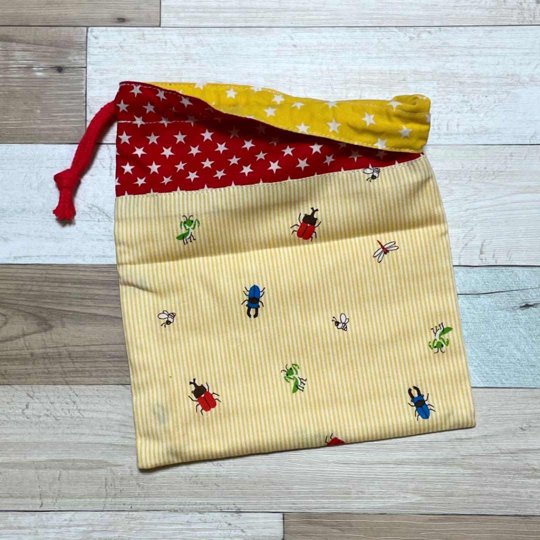 ハンドメイド★キイロストライプ。カラフル昆虫プリント片側紐出し巾着。入園グッズ