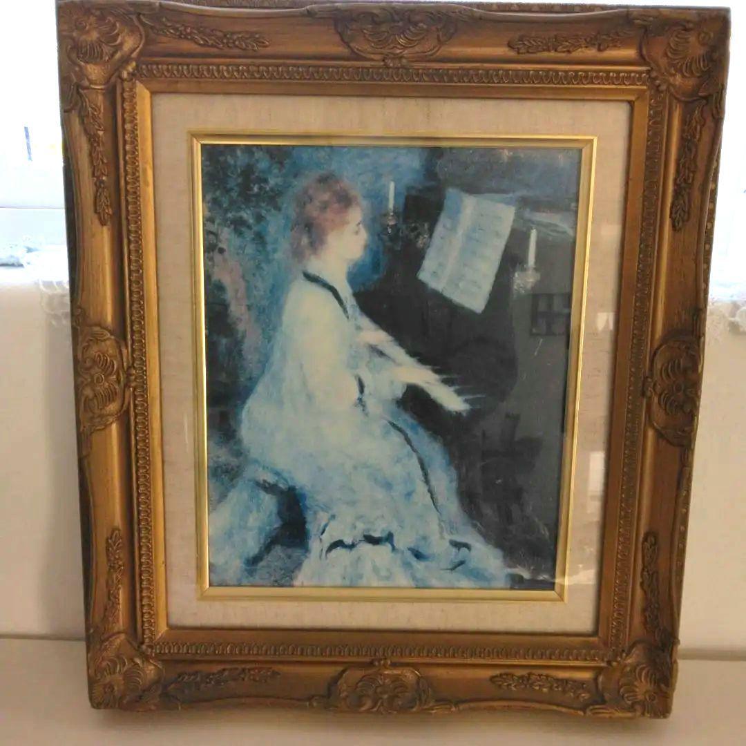 ピアノを弾く女性の絵画