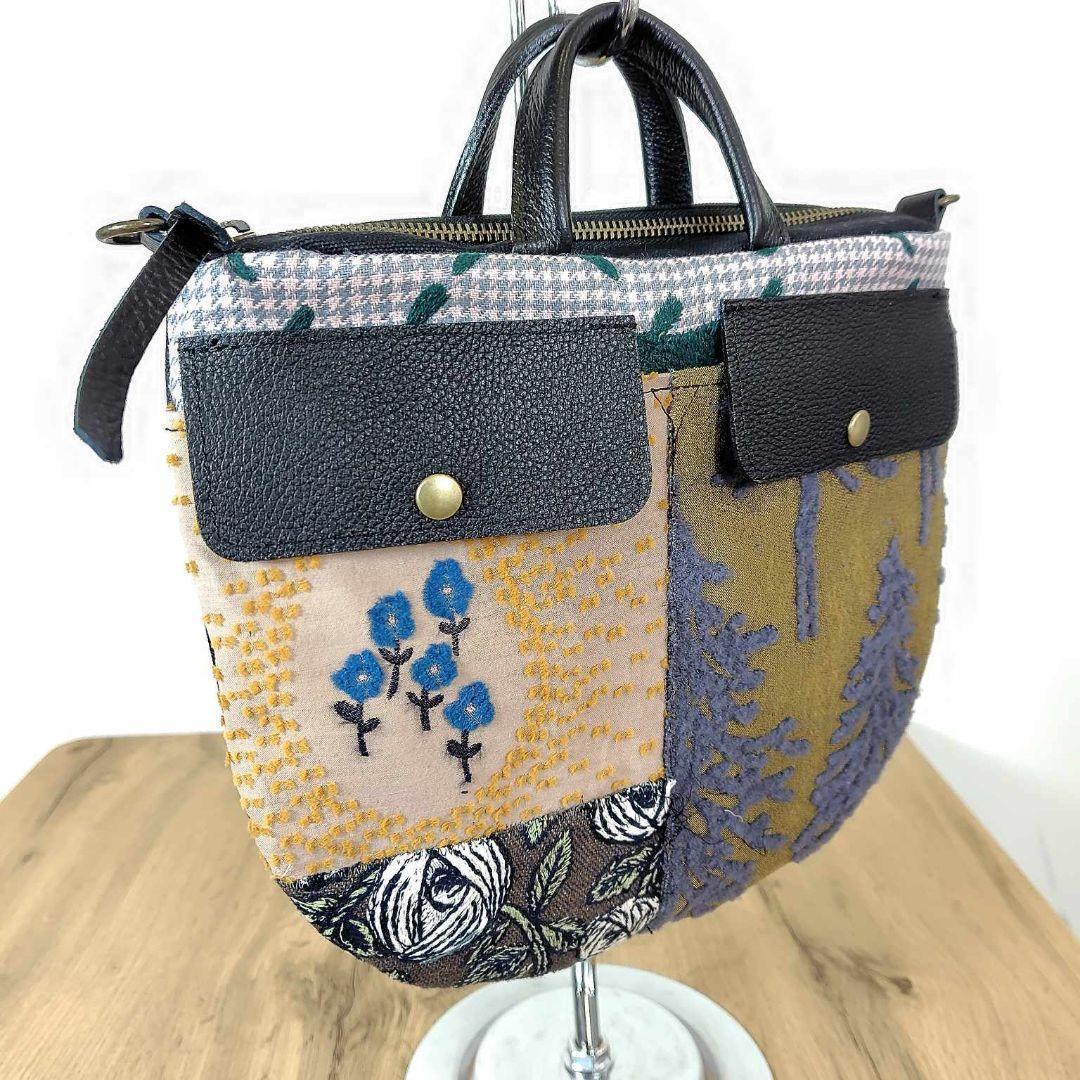 ミナペルホネン/バラッド　メッツァ/フタポケ付きロングラウンドショルダー