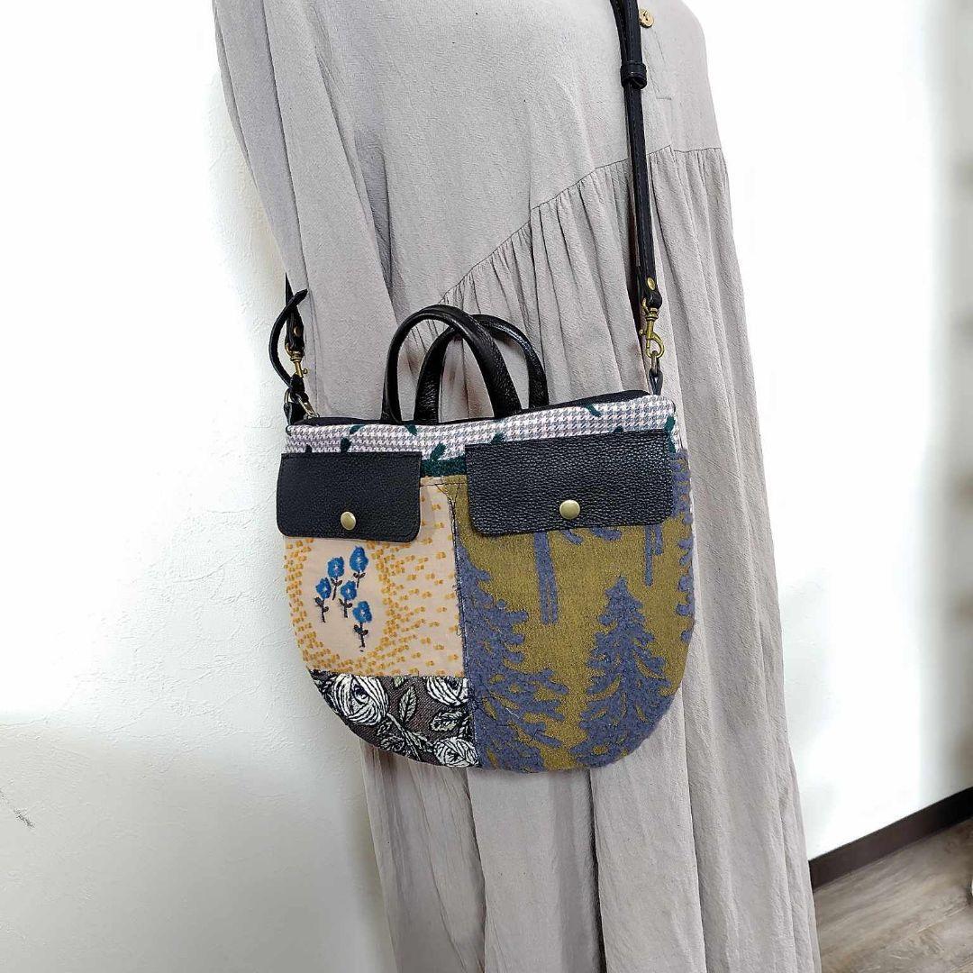 ミナペルホネン/バラッド　メッツァ/フタポケ付きロングラウンドショルダー