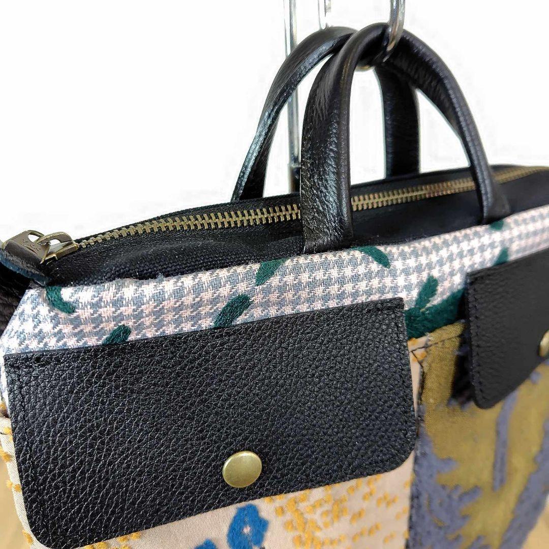 ミナペルホネン/バラッド　メッツァ/フタポケ付きロングラウンドショルダー