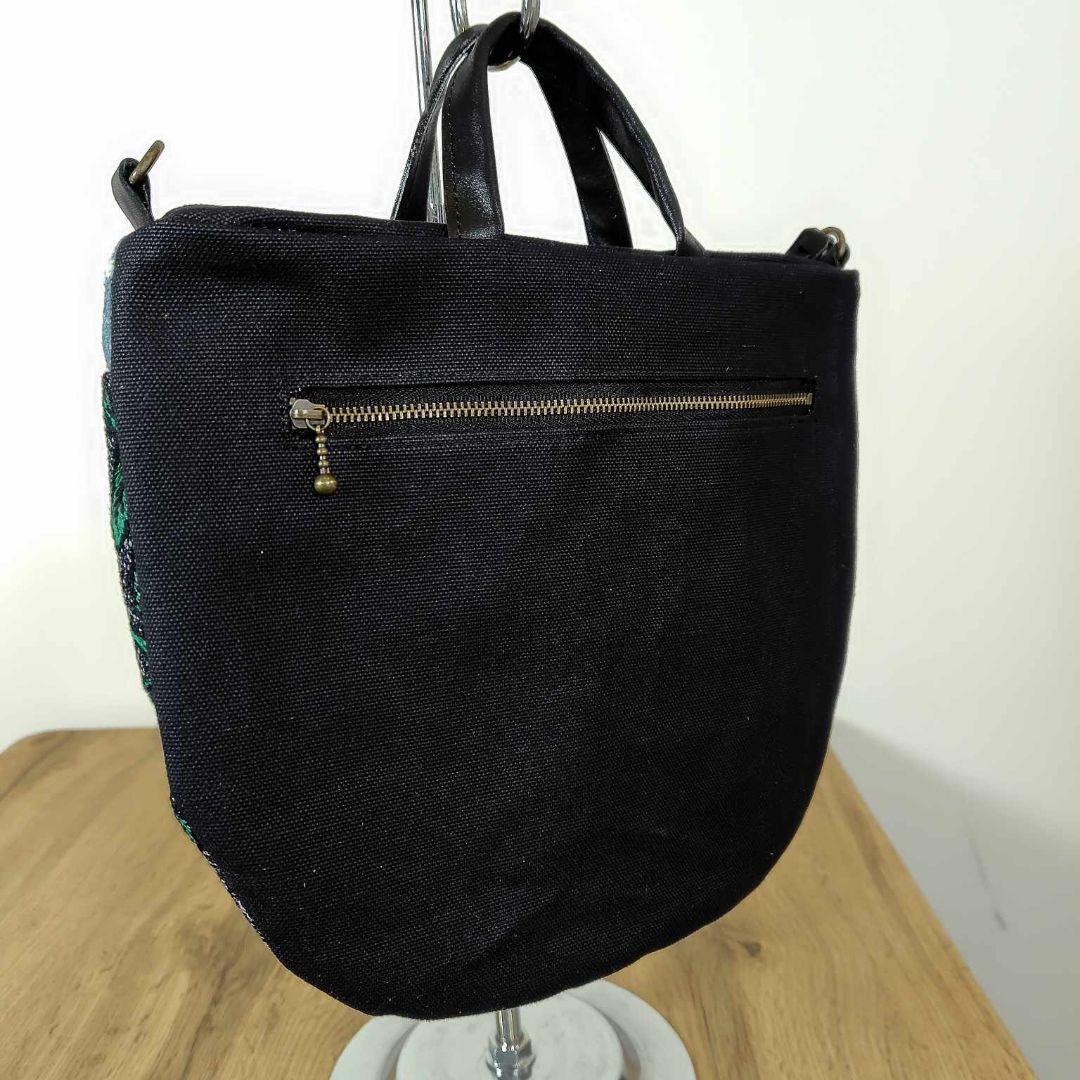 ミナペルホネン/バラッド　メッツァ/フタポケ付きロングラウンドショルダー