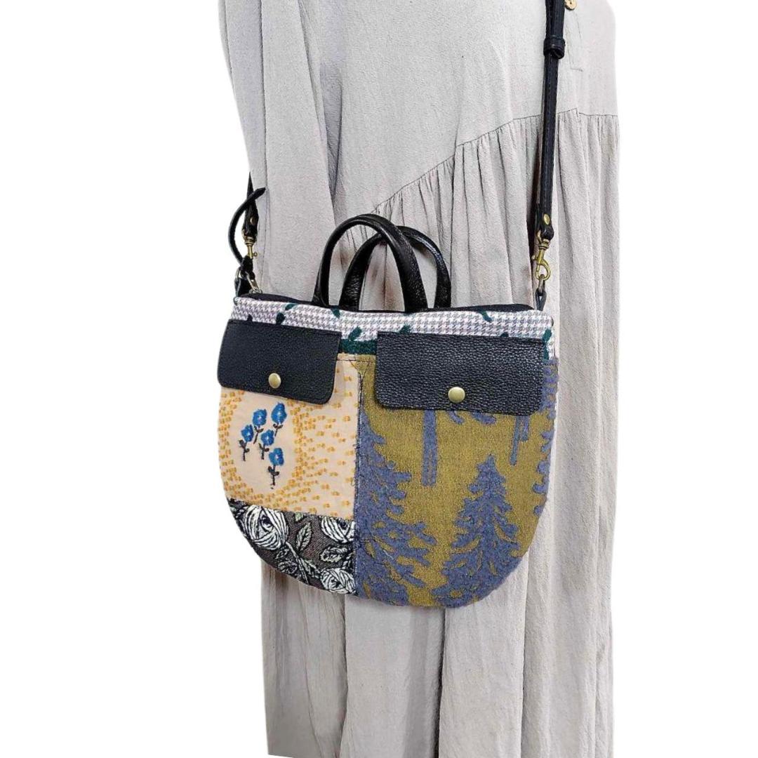 ミナペルホネン/バラッド　メッツァ/フタポケ付きロングラウンドショルダー