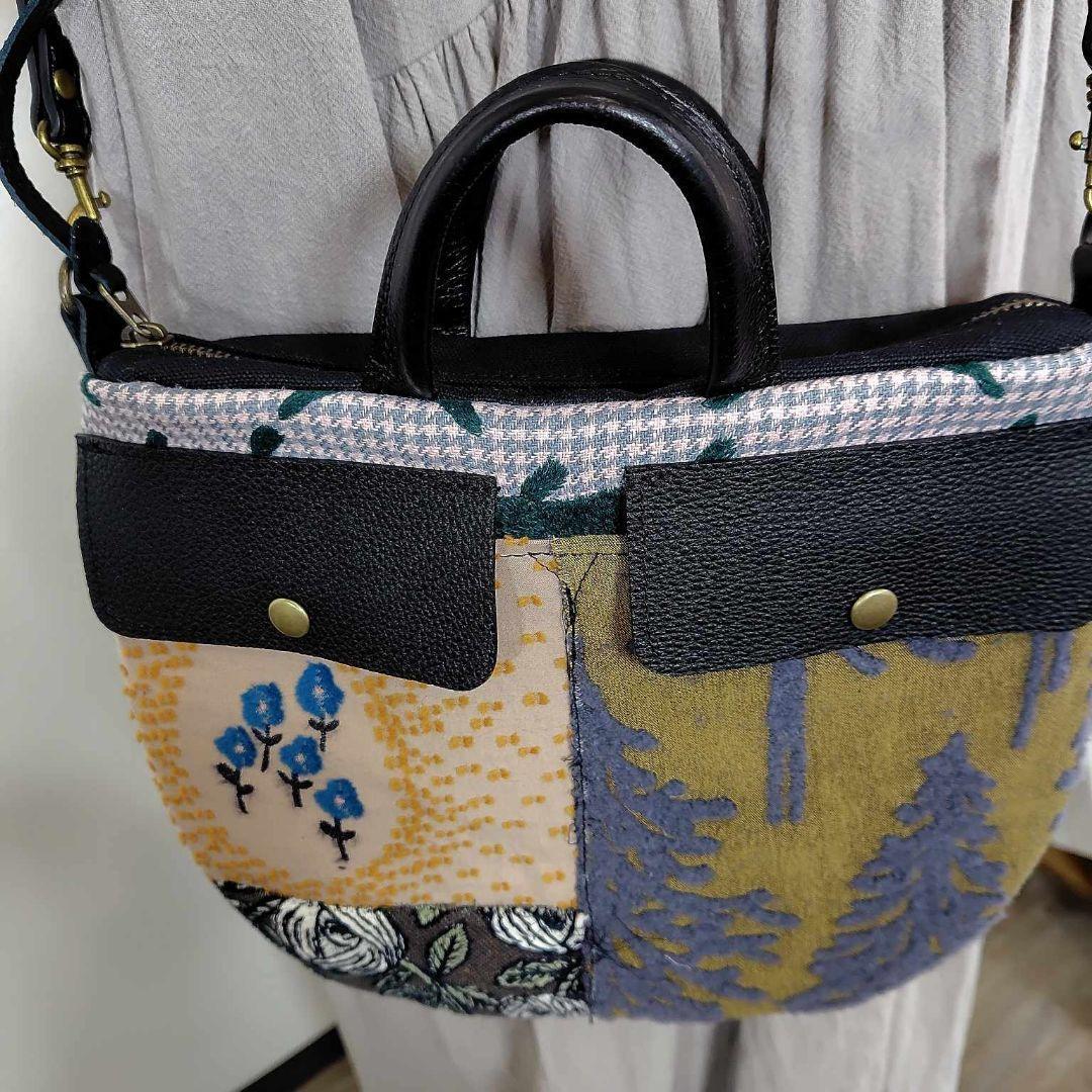 ミナペルホネン/バラッド　メッツァ/フタポケ付きロングラウンドショルダー