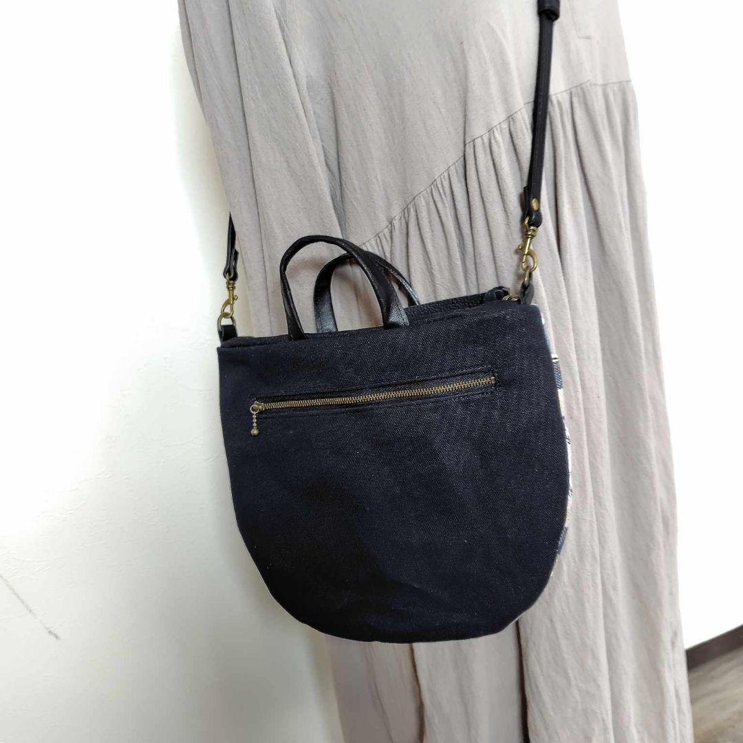 ミナペルホネン/バラッド　メッツァ/フタポケ付きロングラウンドショルダー