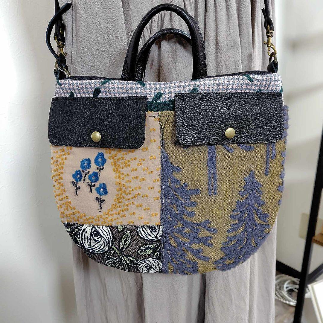 ミナペルホネン/バラッド　メッツァ/フタポケ付きロングラウンドショルダー